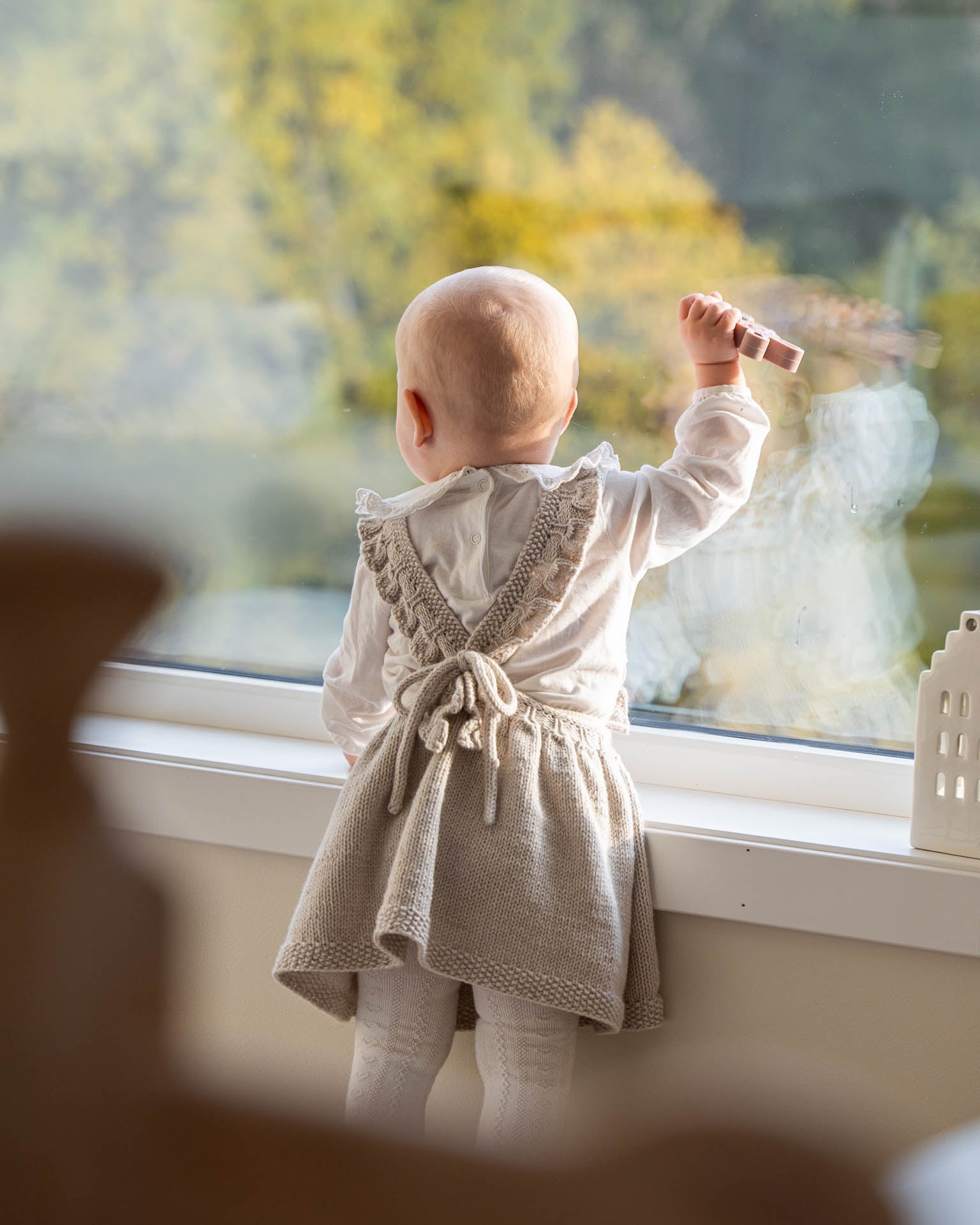 Et søtt og tidløst seleskjørt med blondekant i midjen og på selene. 